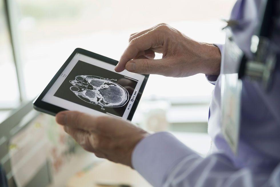Doctor Examining CT Scan